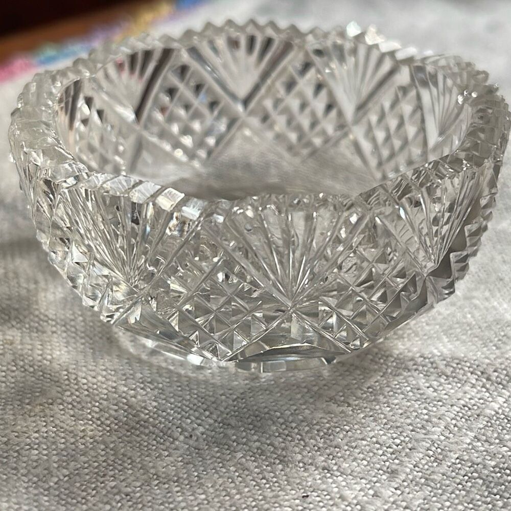 Ornate cut glass open salt dish.